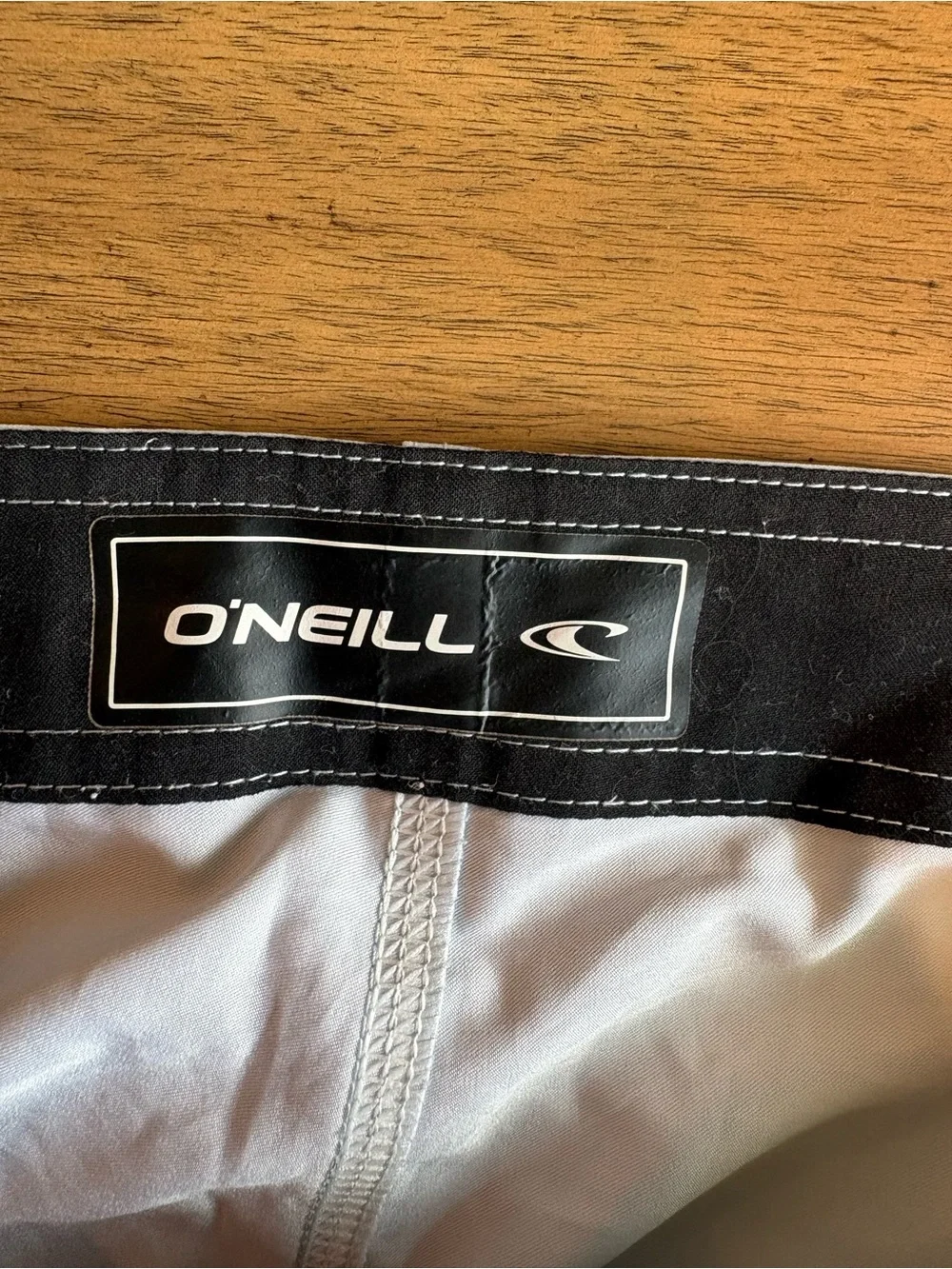O'Neill Men's Sky Blue, Orange & Gray Striped Boardshorts, size 25